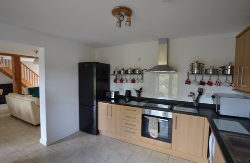 Pentney Cottage | South facing 4br lodge with Hot tub in 1/4 acre in tranquil setting.