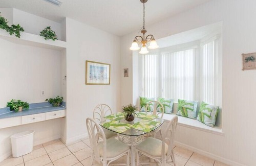 Calabay Parc Villa | South Facing Pool beside palms and grassland. Light, Spacious with Games Room ,