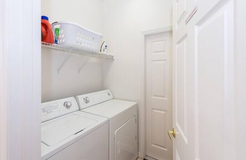 Calabay Parc Villa | South Facing Pool beside palms and grassland. Light, Spacious with Games Room ,