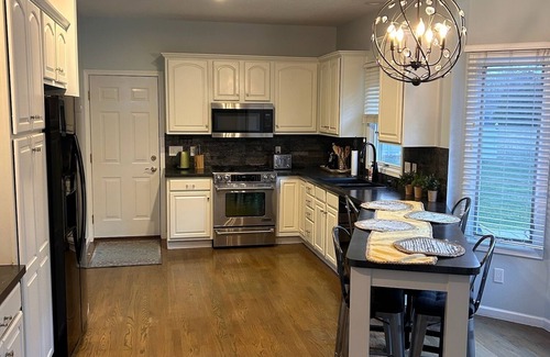 Stevensville House | Spacious 4 bdrm 4 bath home on an acre. 1 mile to Lake Michigan. St.Joe area.