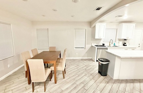 Baker Street House | Spacious 4-bedroom house in charming Bakersfield with AC. 4 queen & 3 twin beds.