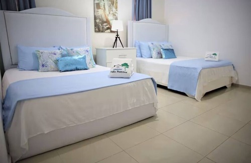 Miramar Villa | Spacious 8-bedroom villa in welcoming Santo Domingo Este with WiFi, AC