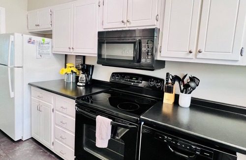 Golden Mile House | Spacious and Central Family/Pet Friendly Townhome with Pool, Half Mile to Beach!