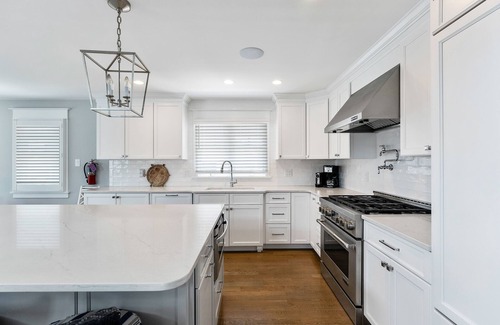 Avalon House | Spacious deck has ocean views as home is across the street from the beachblock.