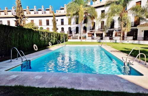 Velez de Benaudalla Apartment | Spacious duplex apt; large roof terrace boasting amazing views & shared pools