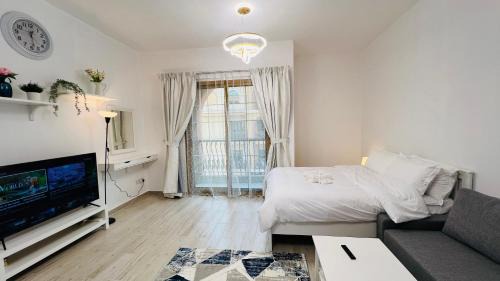 International City Apartment | Spacious Furnished studio with balcony Spain cluster International city