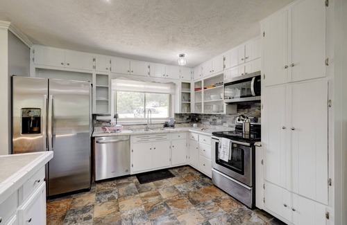 Madisonville House | Spacious home with basement. City park steps away. Cleaning fee included.