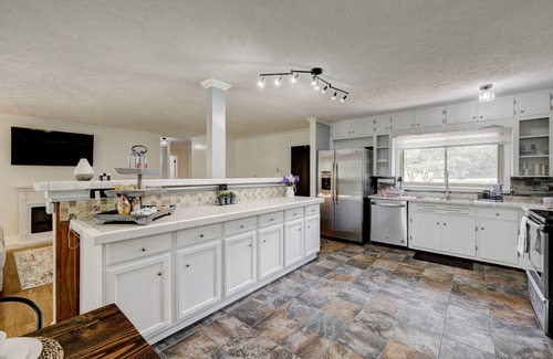 Madisonville House | Spacious home with basement. City park steps away. Cleaning fee included.