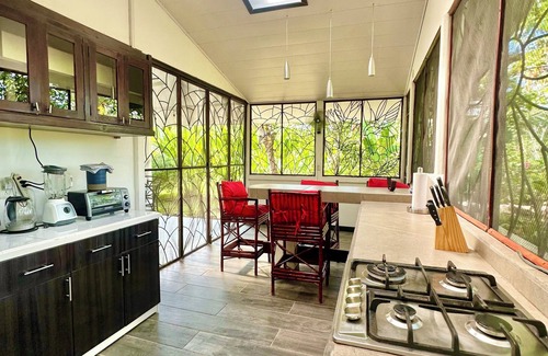 Puerto Jimenez House | Spacious rental home on the outskirts of Puerto Jimenez with WiFi, AC & garden