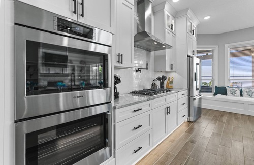 Green Cove Springs House | Spacious riverfront home perfect for larger families, featuring stunning river views, private dock