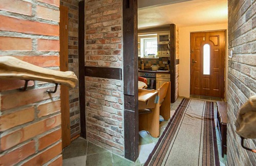 Ustka House | Spend a relaxing vacation in this vacation home with beautiful outdoor area.