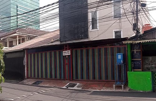 Palmerah Hotel | SPOT ON 90538 Wisma Dewi Syariah