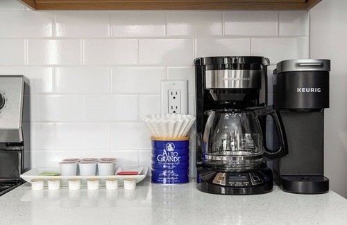 Olde Towne East Apartment | Spotless Monthly Penthouse | Garage Parking + Gym