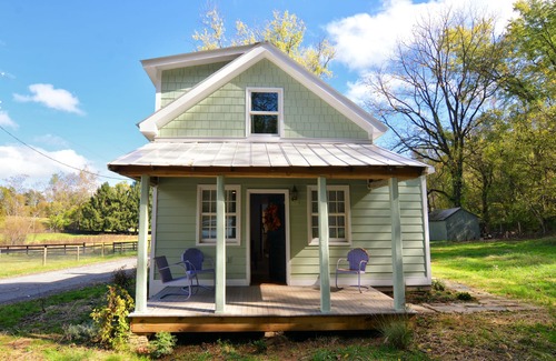 Tuscarora Cottage | Springs Store Cottage Entire Property king bed