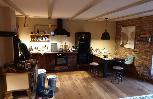 Graal Mueritz House | Stable building at the water tower with 2 vacation apartments without room walls on 2 floors