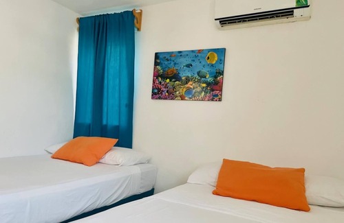 Punta Sam Apartment | Standard Quadruple Room