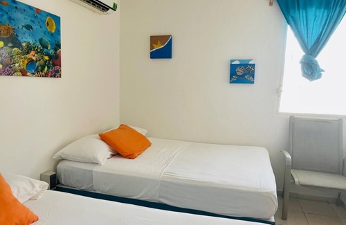 Punta Sam Apartment | Standard Quadruple Room