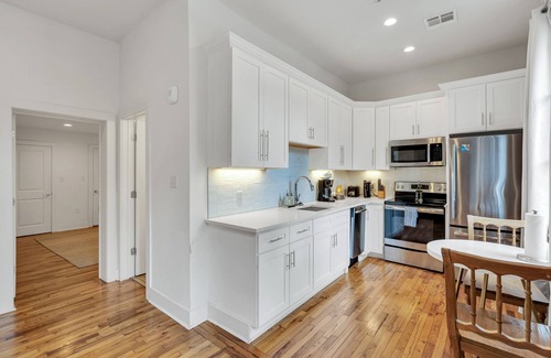 Faubourg Marigny Hotel | Stay in the center of the action with this charming 1-bedroom retreat located on the historic Esplanade Avenue. This unique space combines timeless New Orleans elegance with modern comfort, offering a serene escape just steps from Frenchmen Street.