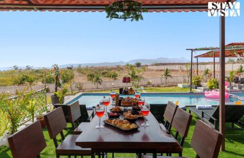 Bajarwadi Villa | StayVista at Mangifera Agro Estate with Pool, Wi-Fi
