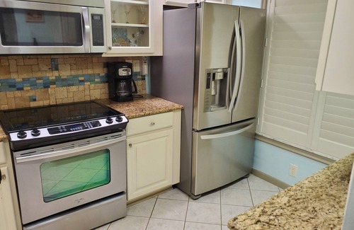 Isla del Sol Condo | Steps away from the pool with Ultimate water views!