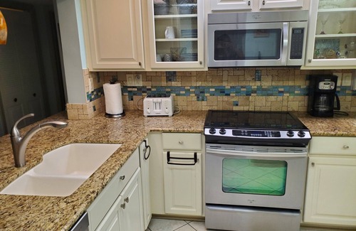 Isla del Sol Condo | Steps away from the pool with Ultimate water views!