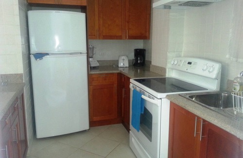 El Batey Apartment | Steps from Sandy Beach, Central 2BD Condo, Pool, Internet/Cable TV, AC, Balcony