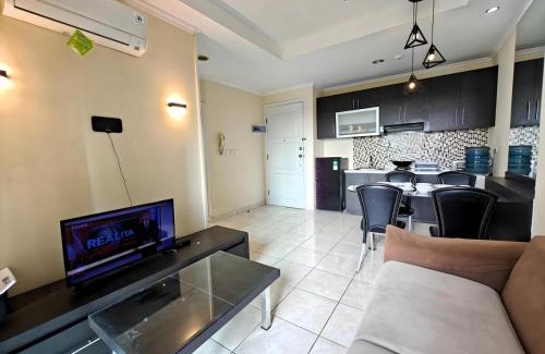 Kelapa Gading Barat Apartment | Strategic 2BR Gading MOI Apt with Wi-Fi, Pool & Gym by 2ndHome