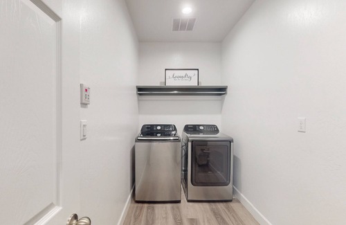 Visalia House | Stunning home with an enclosed yard, pool, jetted tub, board games, W/D, & AC