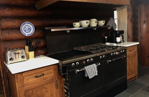 Enchanted Hills House | Stunning lakefront log cabin on a private acre