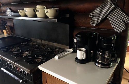 Enchanted Hills House | Stunning lakefront log cabin on a private acre