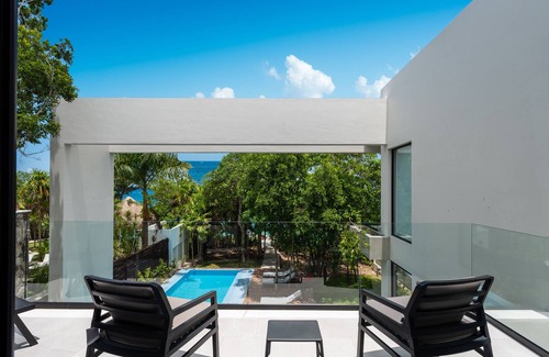 Colonia Andres Villa | Stunning 10-Bedroom Oceanfront Oasis with 2 Pools & Hot Tub