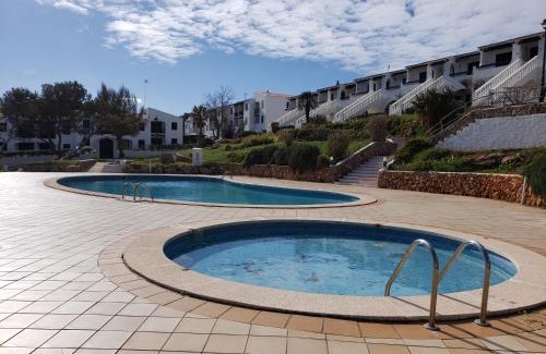 Arenal d'en Castell Apartment | Stunning sea views apartment, pool, 5 min walk to beach, Winner of 2025 Travellers Choice award