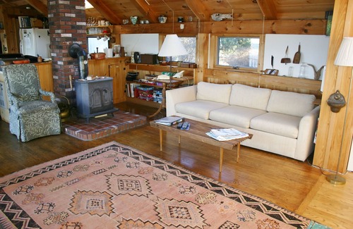 South Addison Cottage | Stunning sunset views from this adorable oceanfront cottage