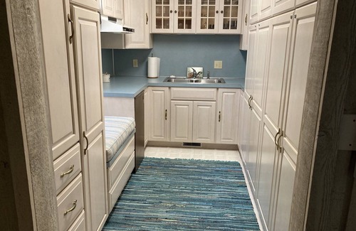 Ludington House | Stunning view of Hamlin Lake, w/deck, fire-pit, screened in porch. Sleeps 6.