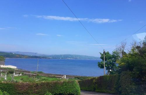 Glenariff House | Stunning views from The Bay, Glenariffe beach