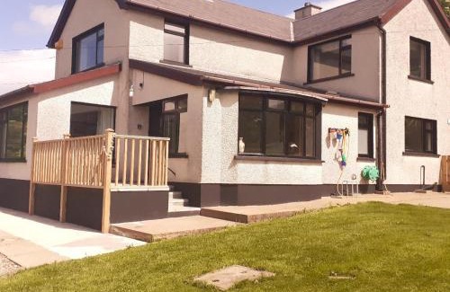 Glenariff House | Stunning views from The Bay, Glenariffe beach