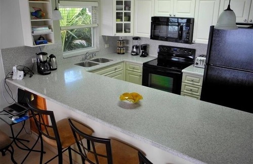Seven Mile Beach Condo | Stunning Views of 7~MB~ Top Floor End-#46 Discovery Point Club
