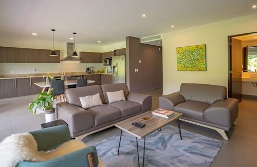 Playacar Fase II Apartment | Stylish Home in 5 Star Condominium, 2 Bedrooms, Gym, 4 Pools, Nature & Relax