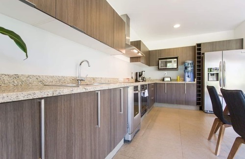 Playacar Fase II Apartment | Stylish Home in 5 Star Condominium, 2 Bedrooms, Gym, 4 Pools, Nature & Relax