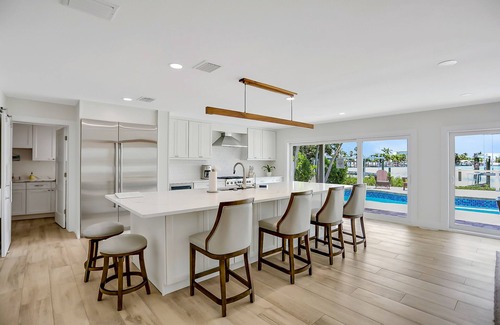 Indian Rocks Beach House | Stylish waterfront home with private pool, dock, within steps to the Gulf & WD