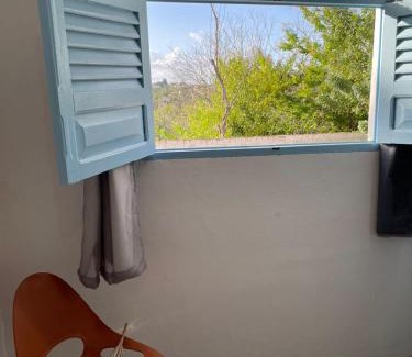 Areia House | Suíte Aconchego