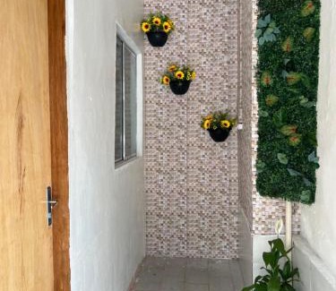 Umarizal Apartment | Suíte com cozinha em área nobre