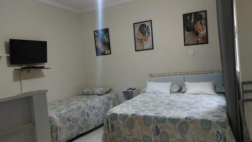 Sao Lucas House | Suítes da Rô - hospedaria familiar diária e temporada