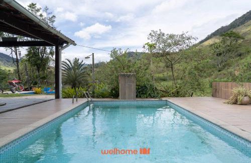 Macae Apartment | Suite em Macae com vista lago e piscina