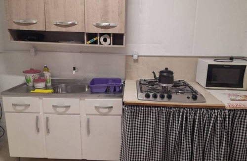 Cidade Nova Apartment | suite+kitchen twelve with air conditioning