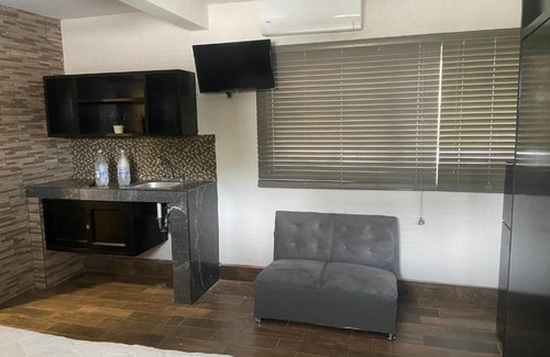 Tuxtla Gutierrez Apartment | Suites Marimba’S