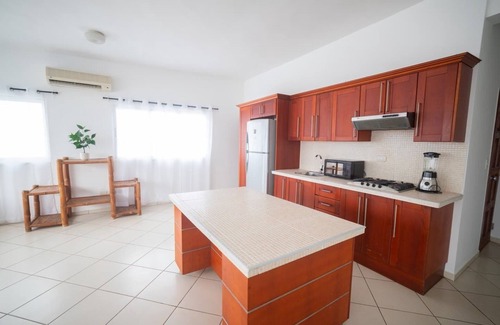 El Batey Apartment | Sunny Caribbean condo, 2BD, pool/Wi-Fi/cable TV, guest-friendly, near everything