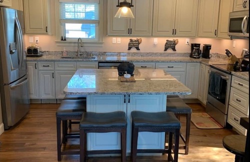 Lochmere House | Sunset View Lake Front Living with Dock & Boat Ramp on Lake Winnisquam