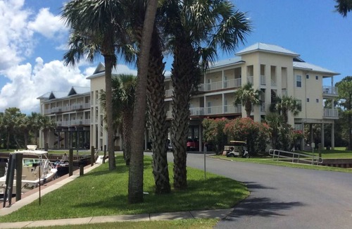 Suwannee Condo | Sunsets, Canal Front, FISH, FISH, FISH! Suwannee Cove - Unit 207, Boat Slip 23