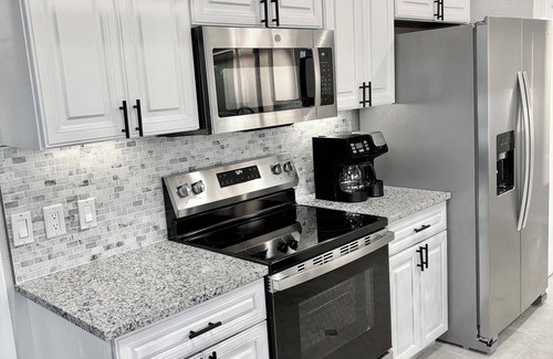 Punta Gorda House | SUPERB! LOCATION! 1 BLOCK 2 FISH VILLE MODERN HOME-HEATED SALT POOL-SPA-E BIKES